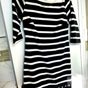 Black and white thick winter dress with beautiful lace ending at the bottom